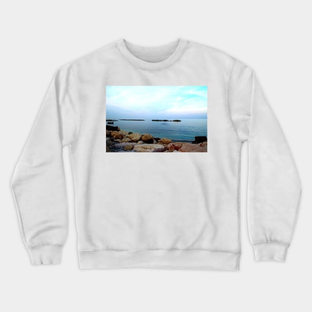 Calm Adriatic sea surrounded by massive rocks under the light blue sky Crewneck Sweatshirt by KristinaDrozd